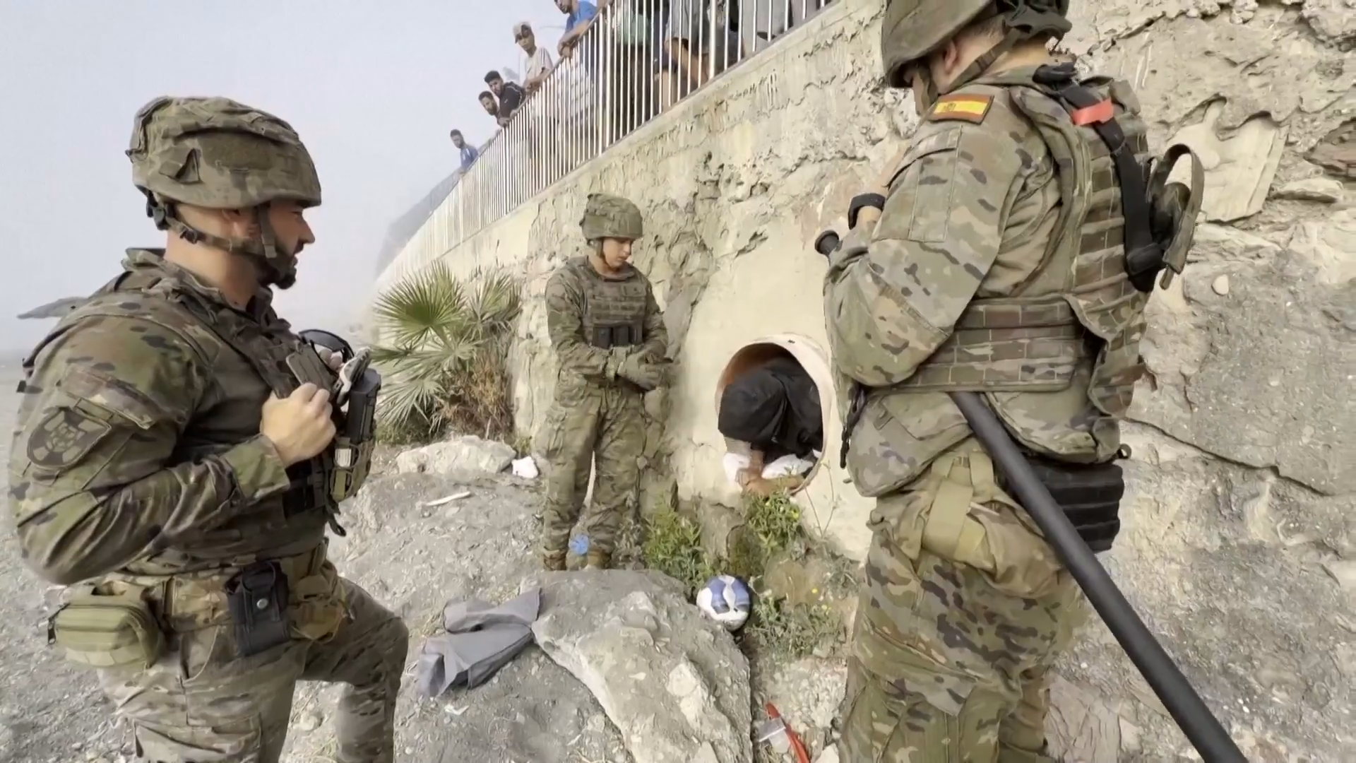 Watch the moment African migrant hiding in pipe caught by Spanish army during Ceuta deportations