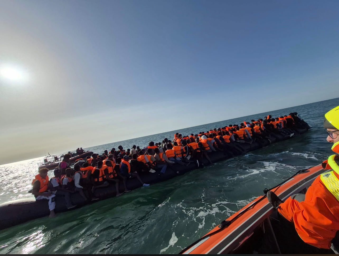 Mega dinghy carrying RECORD number of illegal migrants reaches Britain as 230 cross Channel