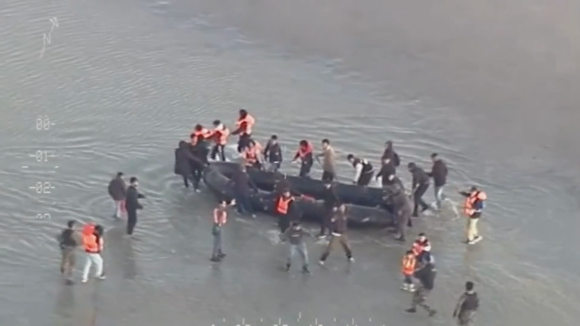 Violent illegal migrants pelt French police with rocks while they slash their dinghy