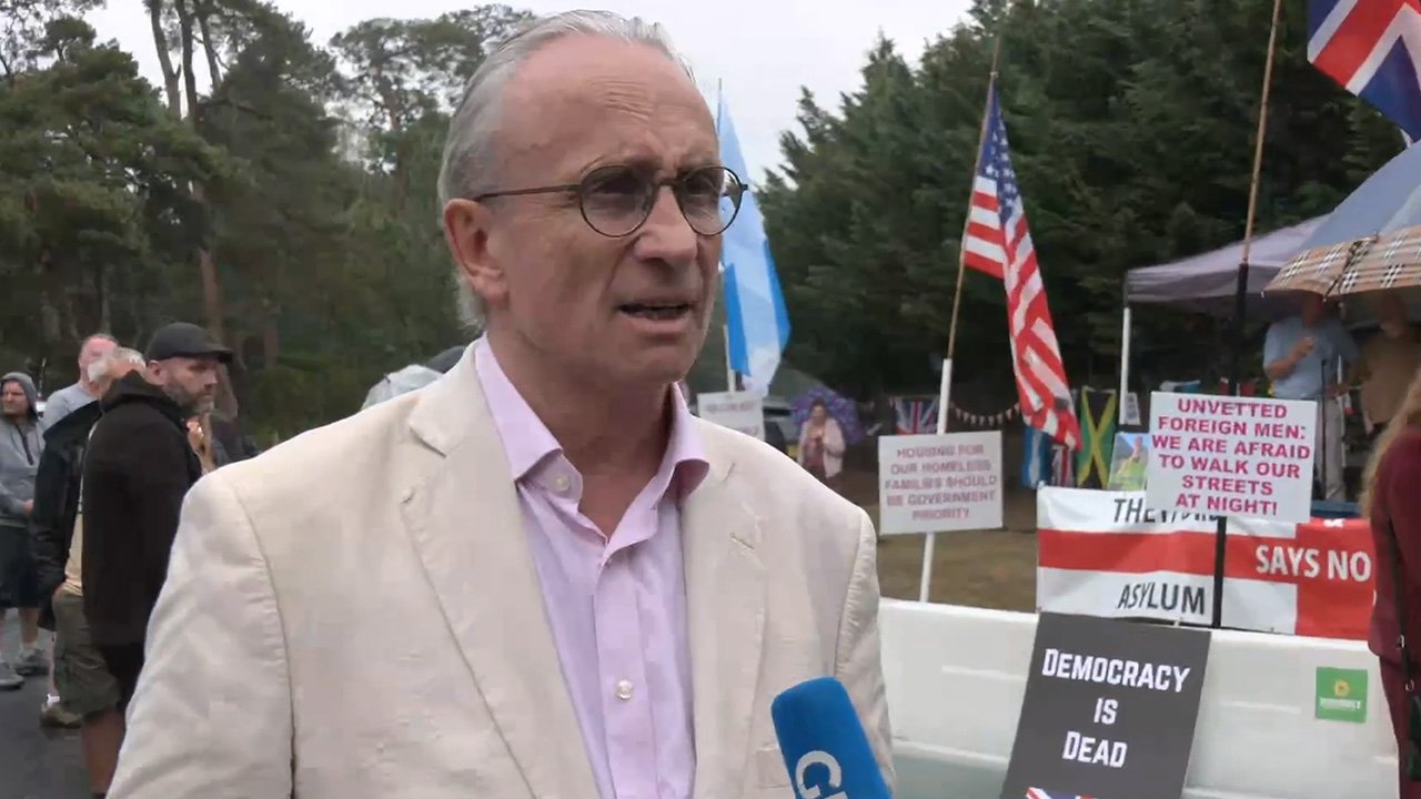 'Totally unacceptable!' Council leader joins furious locals in protest against 1,250 migrants being moved into RAF Barnham