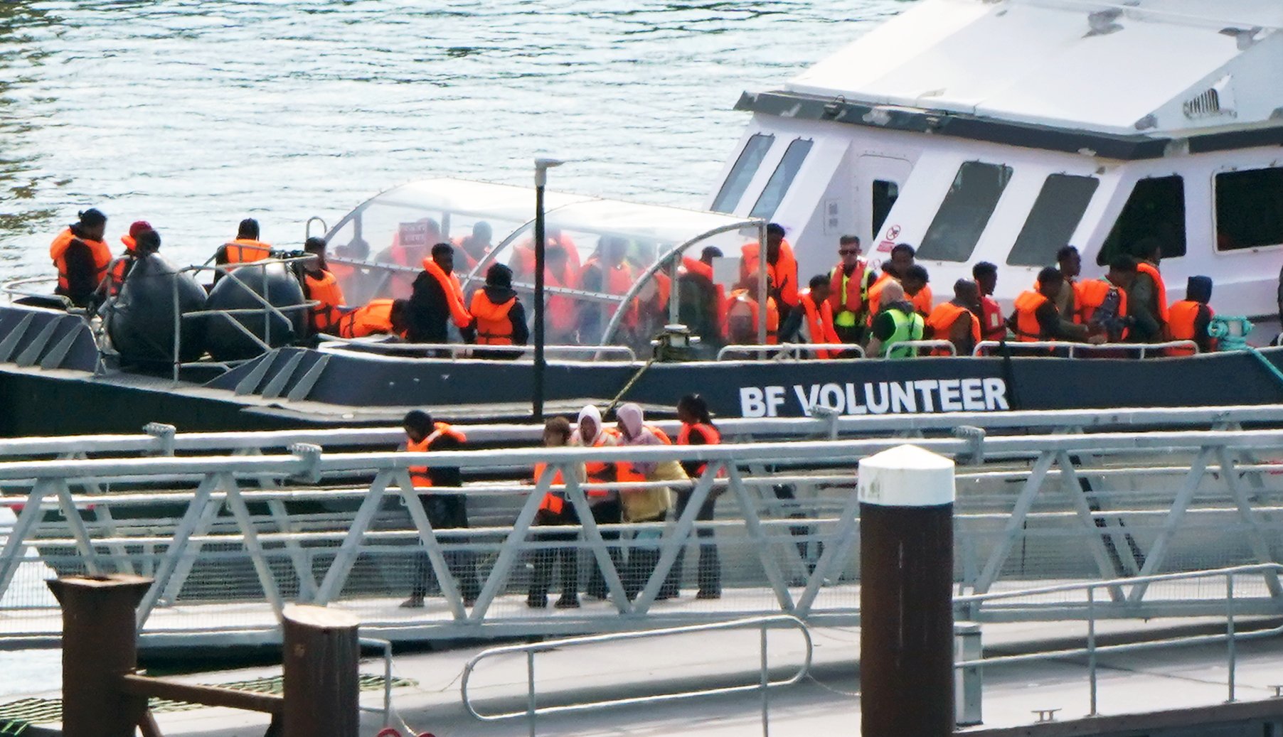 French police investigate death of small boat migrant 'who was attacked by other passengers' while trying to cross Channel