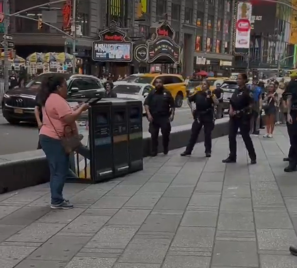New York woman stabs two before being shot dead by police in Times Square