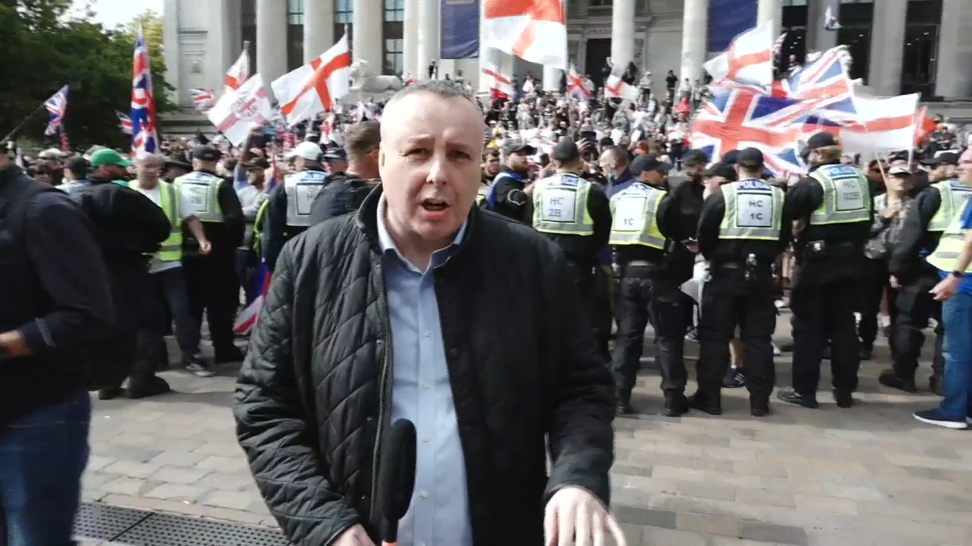 Mark White baffled as police march counter-protesters to face off with anti-migrant demonstrators in Portsmouth