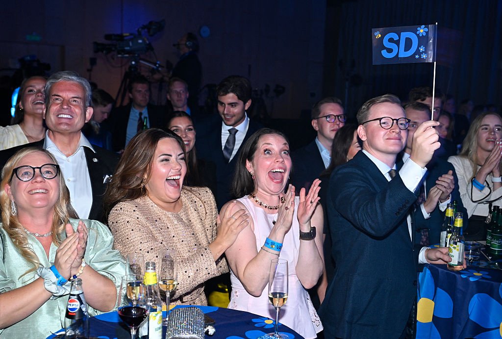 Sweden's centre-left party hangs onto razor-thin lead as election too close to call