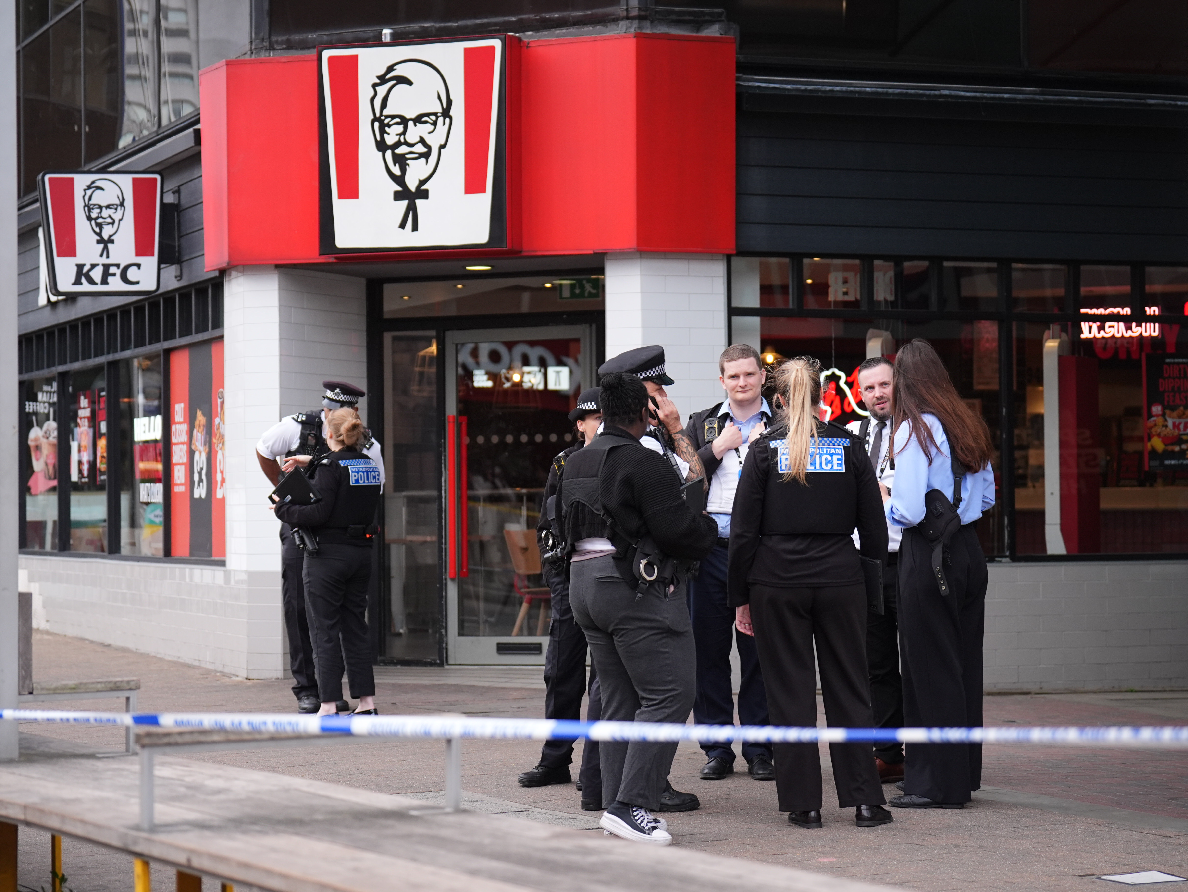 Schoolboy, 14, charged over London KFC 'machete fight' that left four with stab wounds