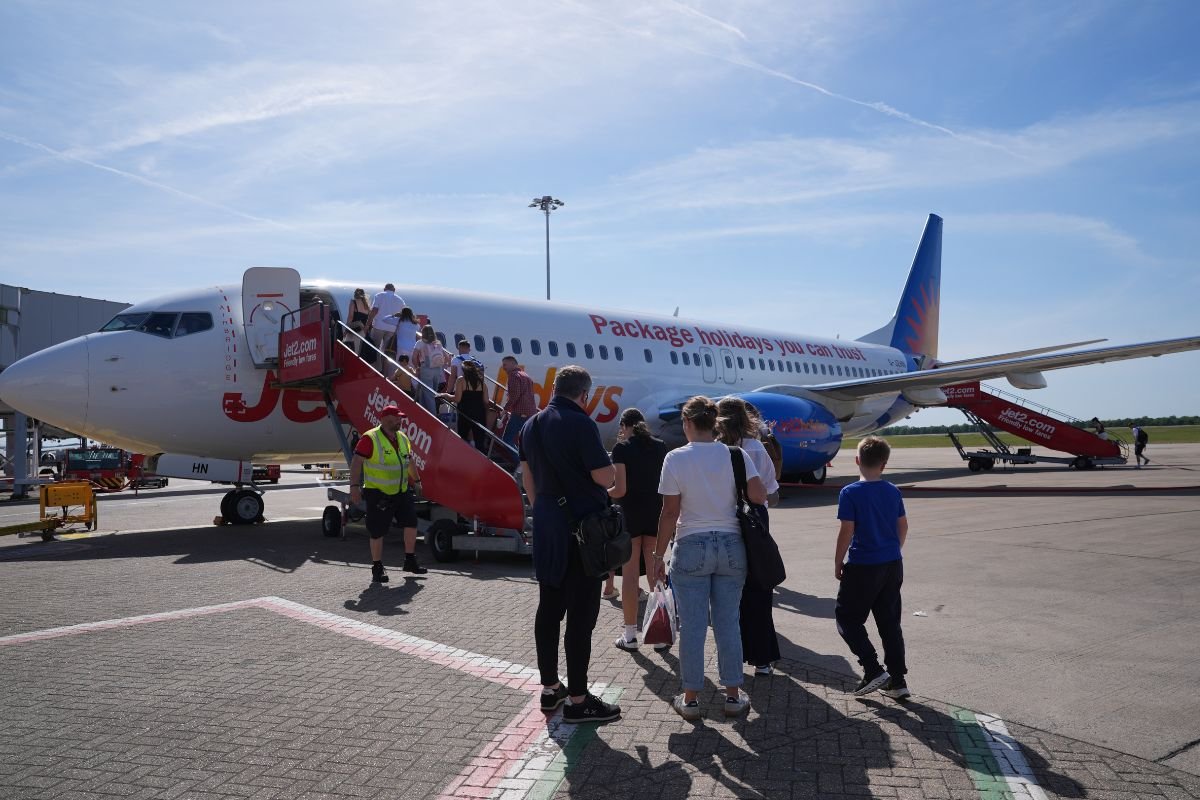 Britons face flight price hikes of up to £400 as Net Zero drive threatens to price families out of holidays abroad