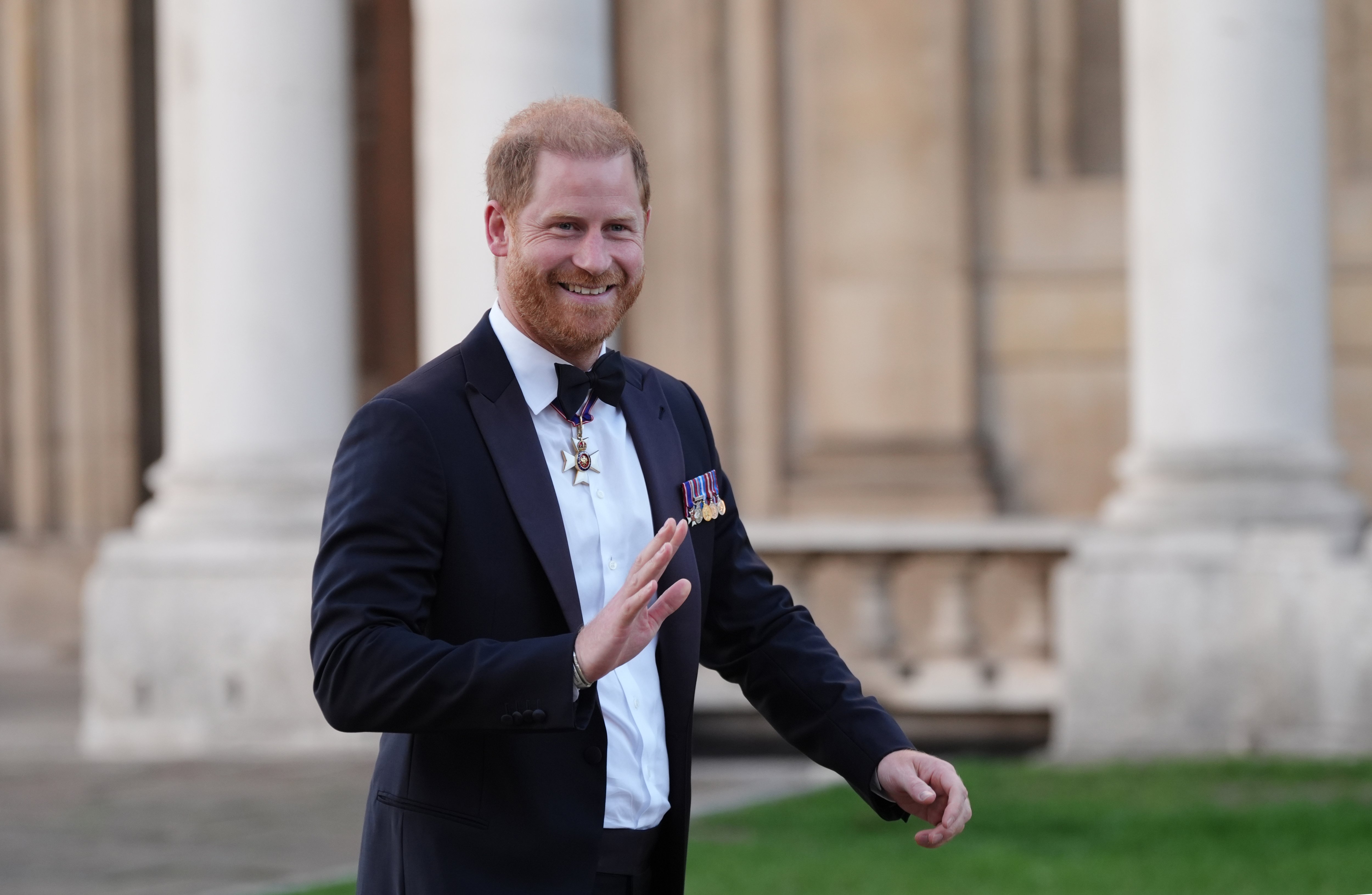 Prince Harry brushes off King Charles bombshell as he steps out for first public appearance since return to UK