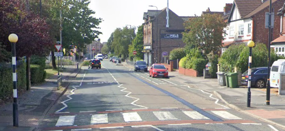 Lollipop man in his 70s struck by car on school crossing as horrified children watch him suffer gruesome injuries