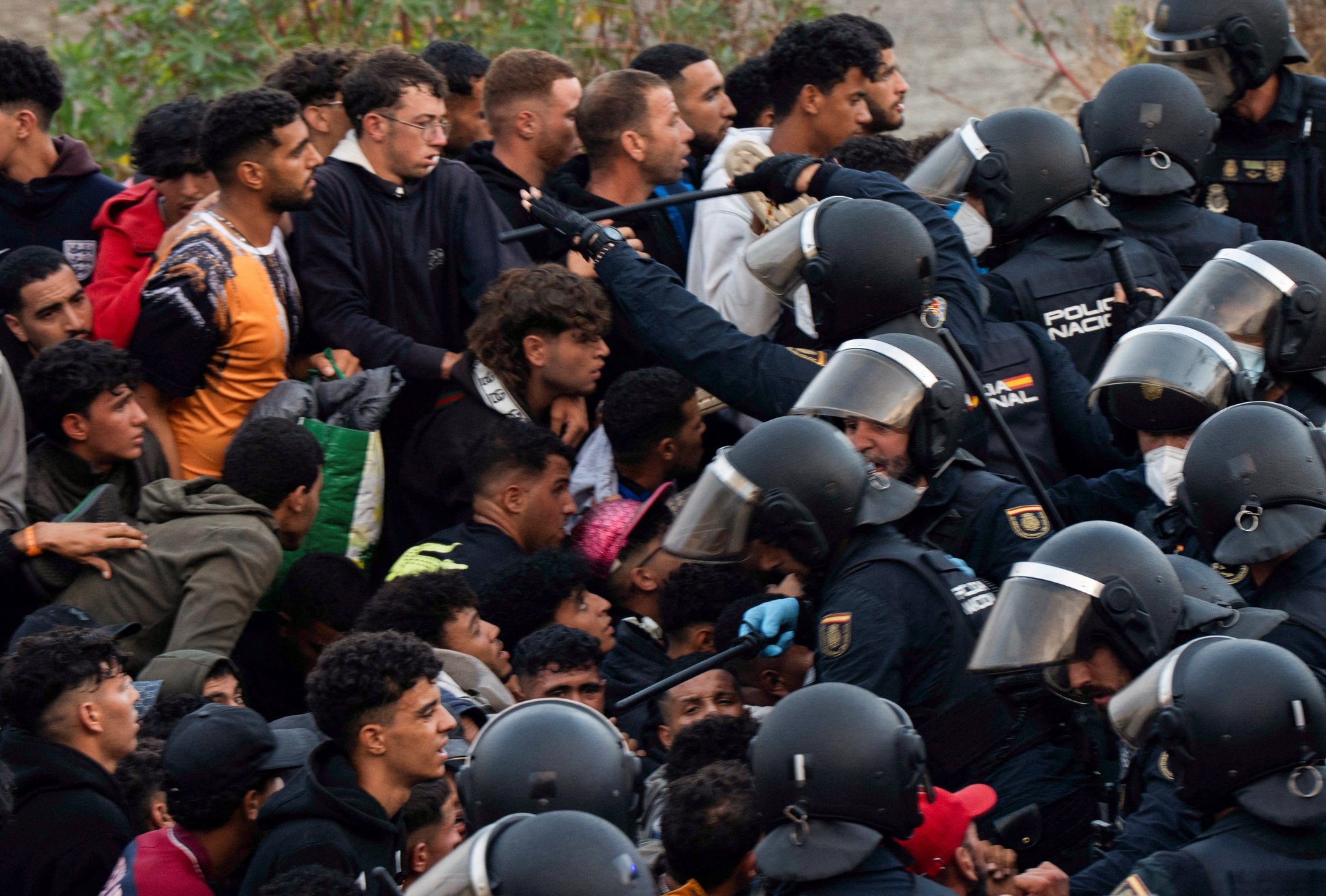 Shots ring out in Ceuta as thousands of illegal migrants charge through enclave