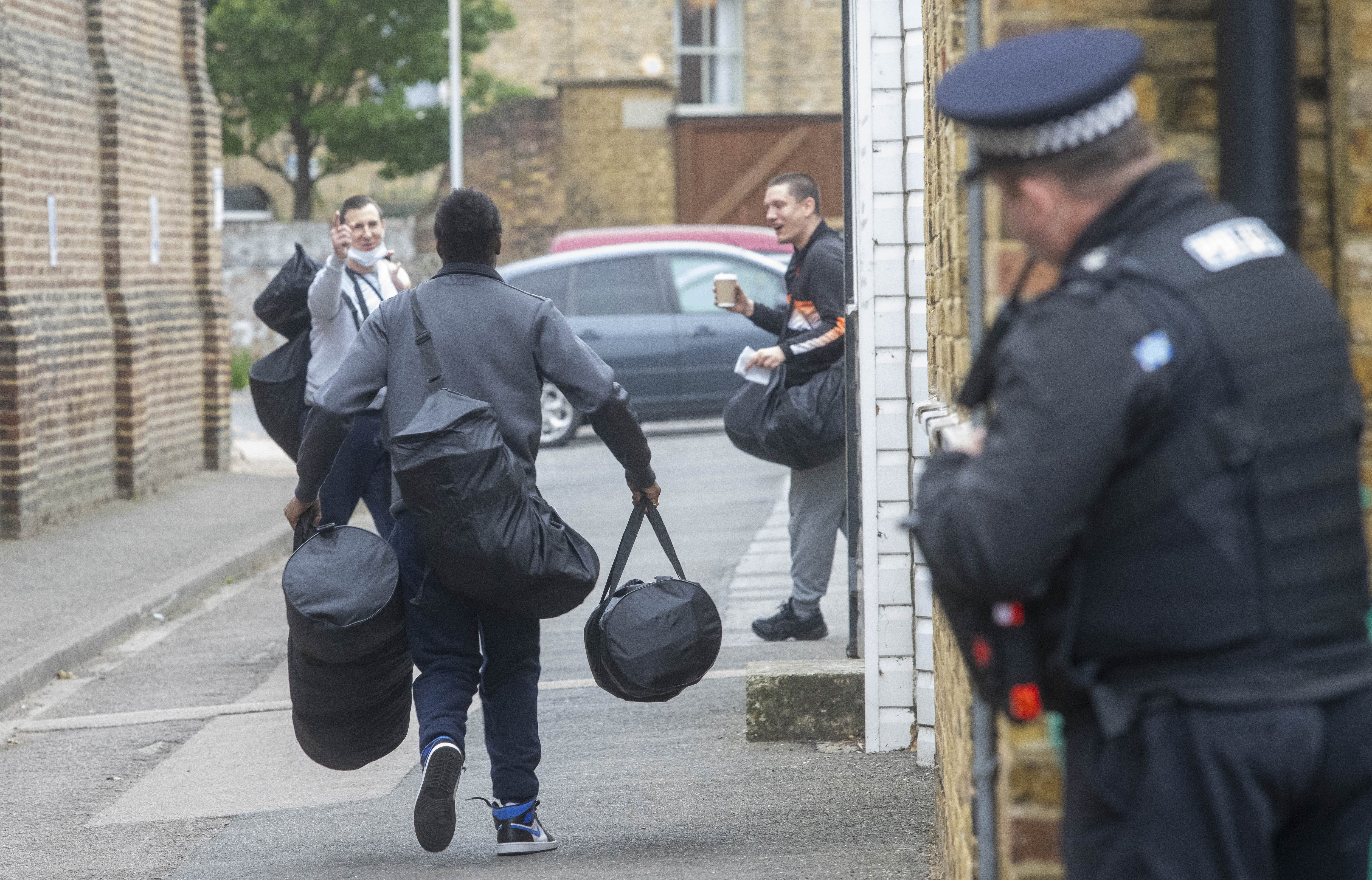 Convicted criminals to flood Britain's streets today as first part of early release scheme begins