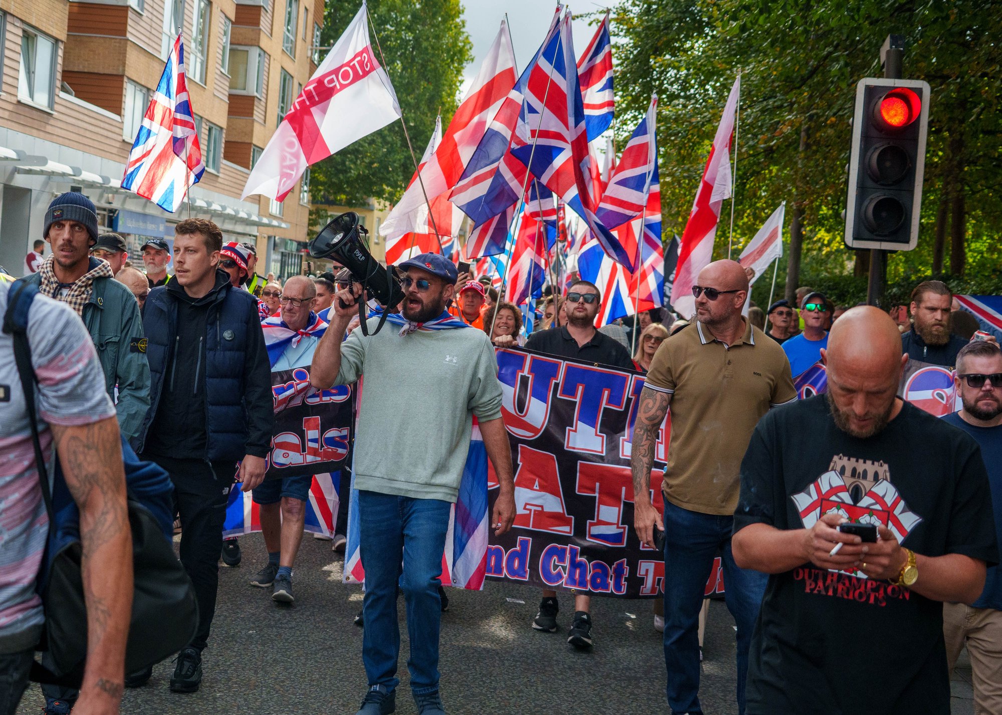 Hundreds of protesters demand end to migrant crisis at two small boat 'drop-off' points on south coast