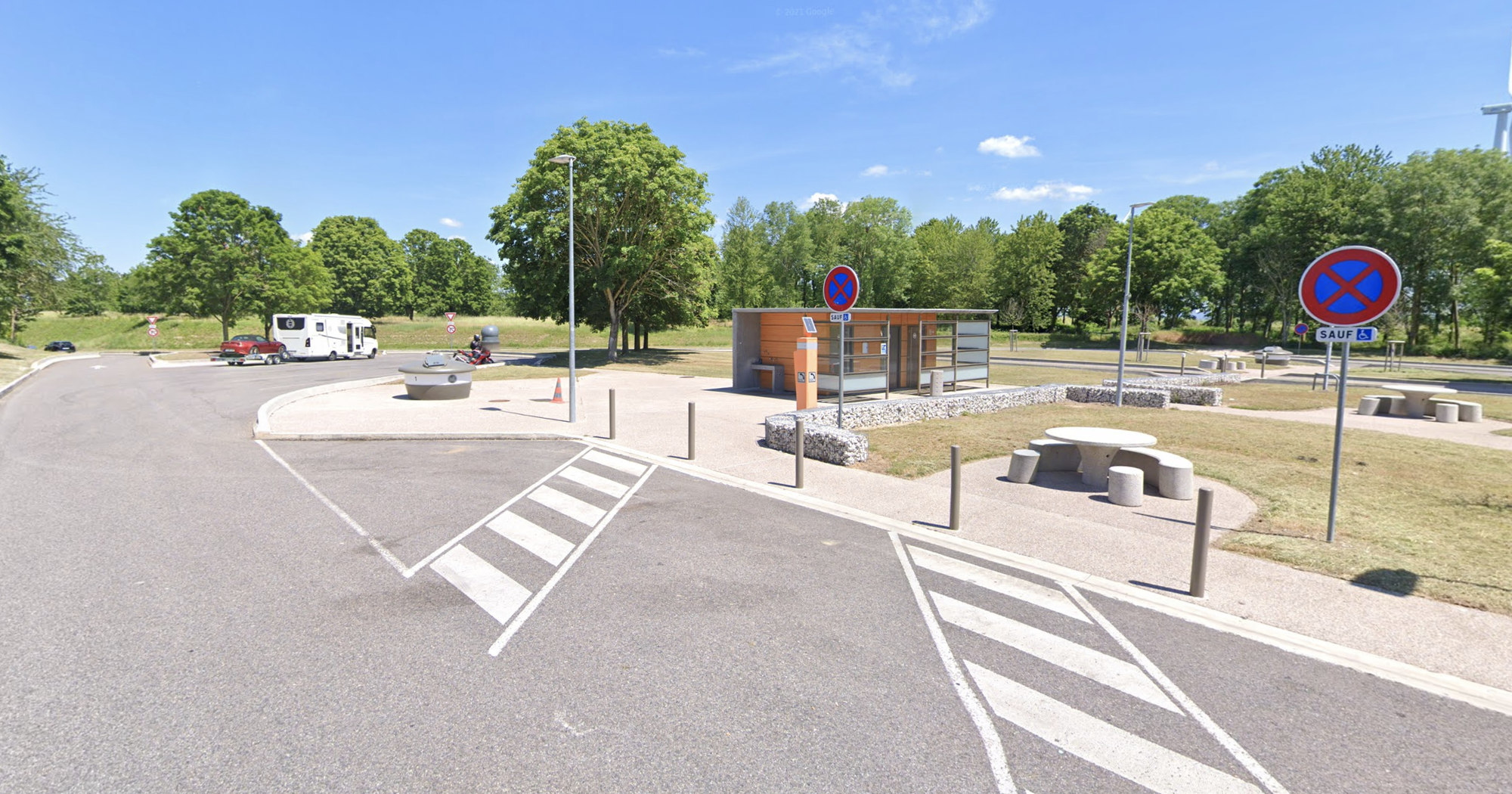Man found shot dead in British van carrying migrants in France