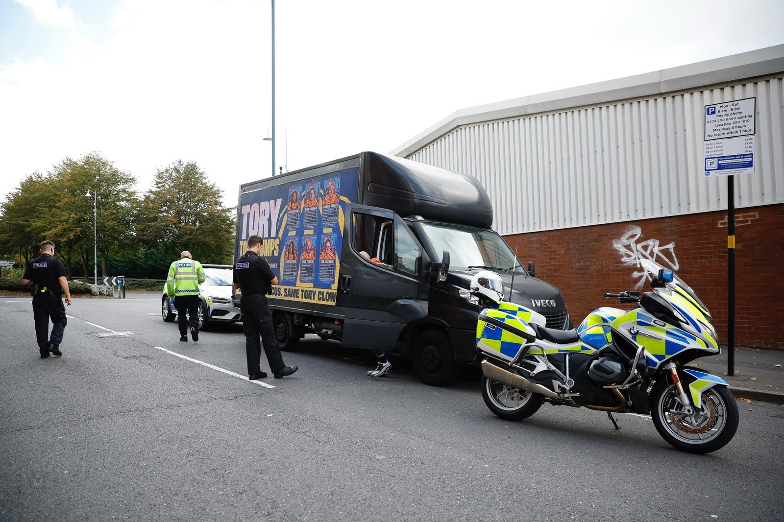 Police stop Reform UK van that shows Kemi Badenoch as a clown outside Tory conference