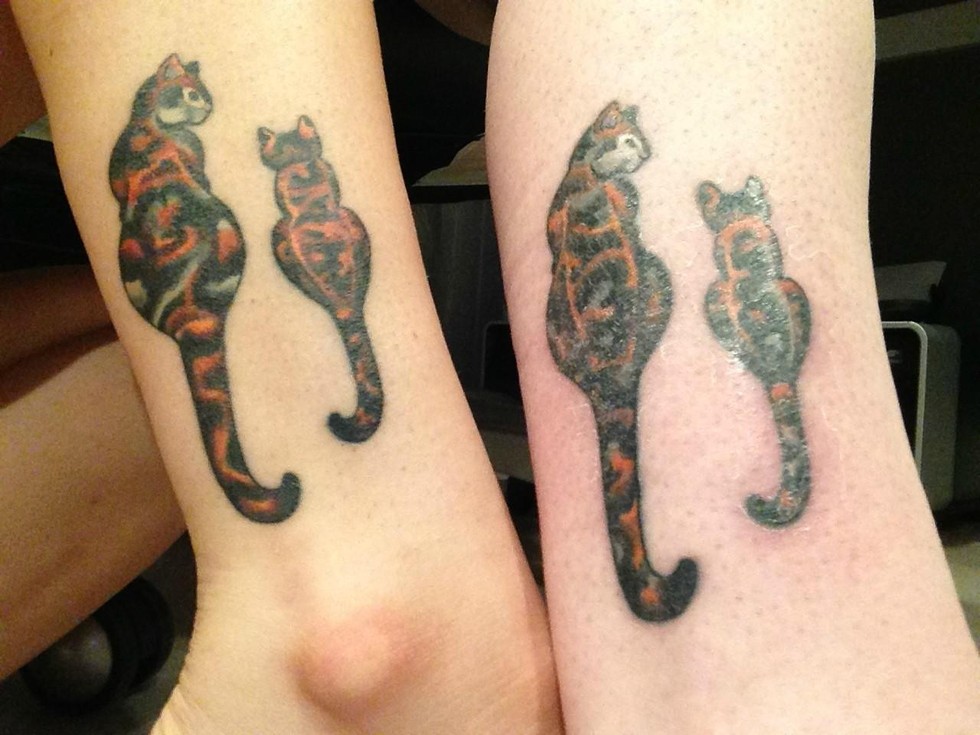 10. This mother and daughter got matching pairs of calico cats.