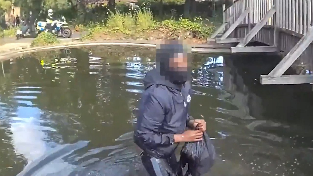 Suspected phone thief arrested after jumping into pond during chase