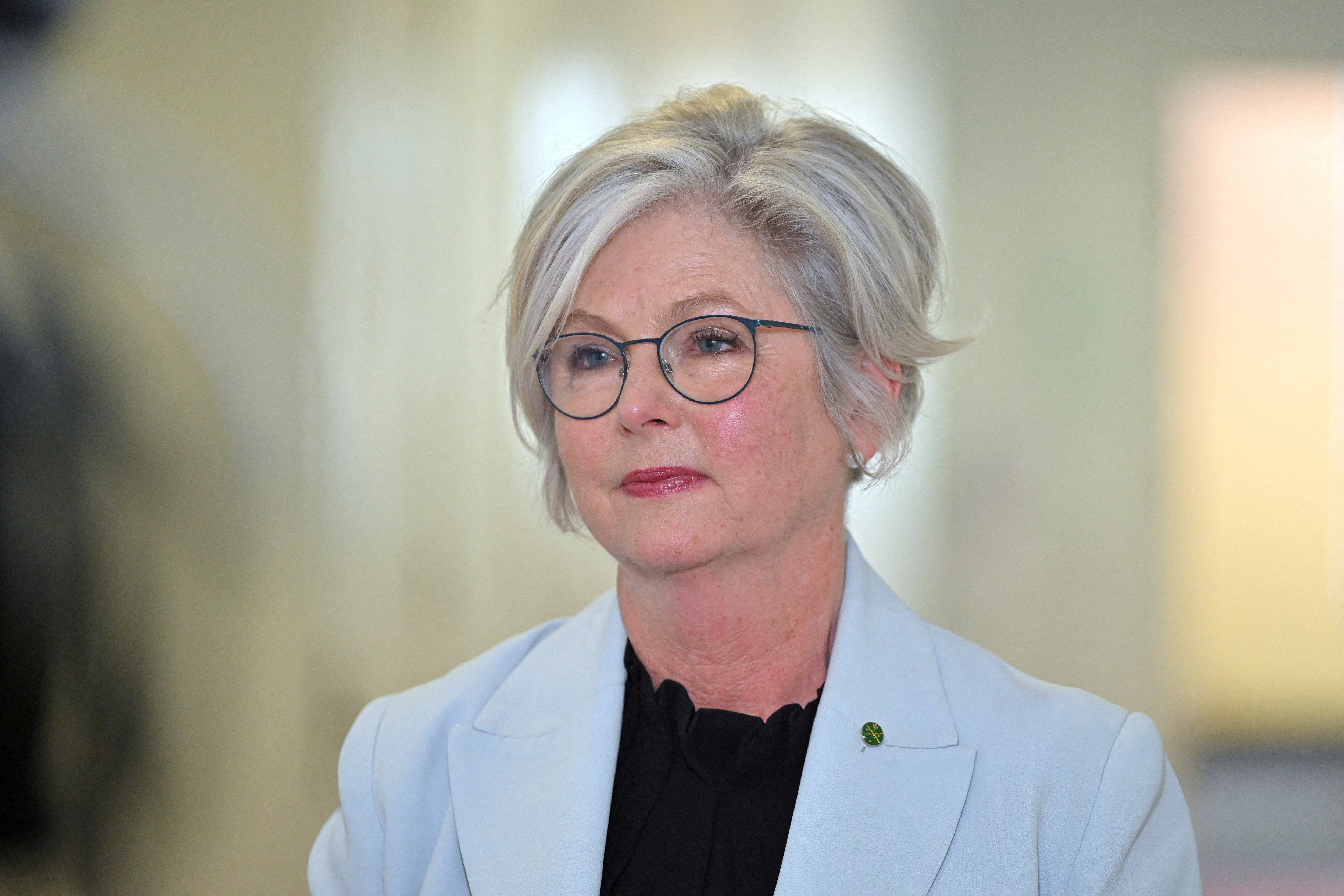 Australian MP has both legs amputated after being struck by car outside office